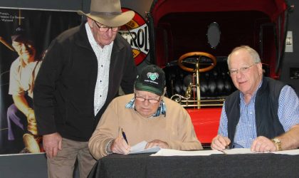 Francis, Robby And Dale Signing Agreement
